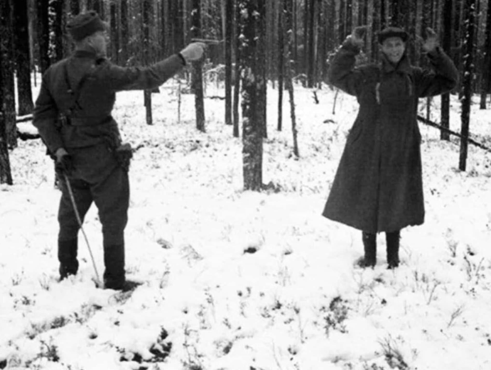 “Soviet spy laughing through his execution in 1942 Finland.”